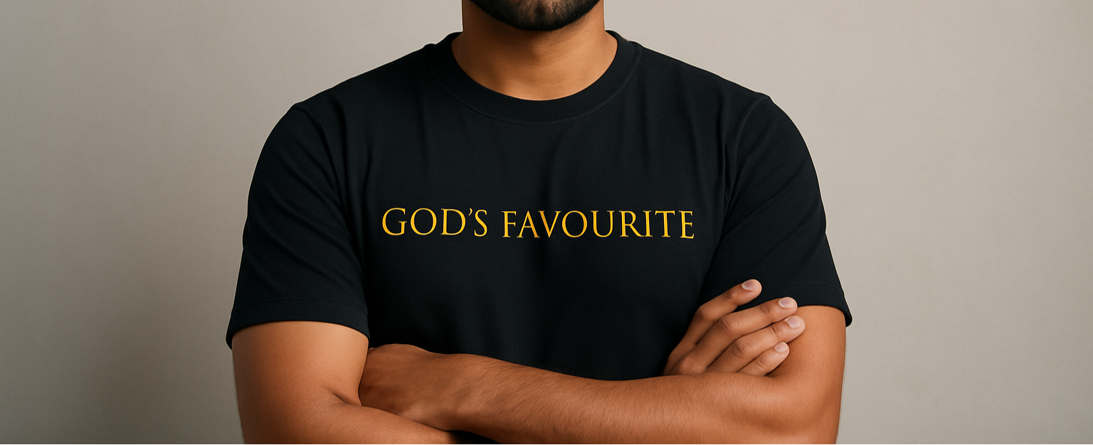 Indian man wearing black crew neck t-shirt